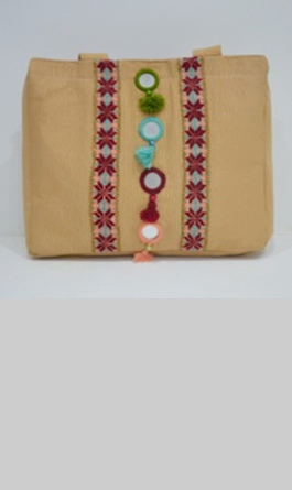 LIGHT LEATHER BAG WITH BALUCHI EMBROIDERY AND MIRROR WORK